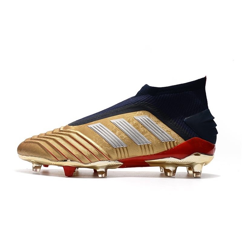 gold and silver football boots