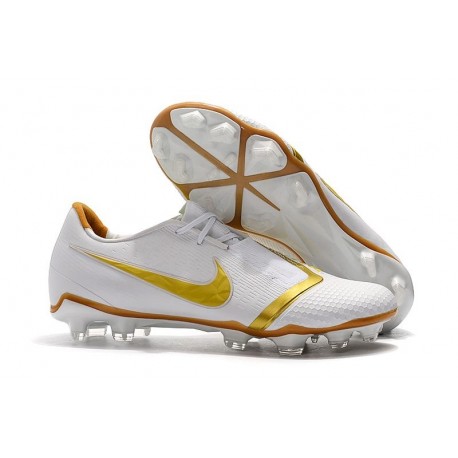 white and gold nike football boots