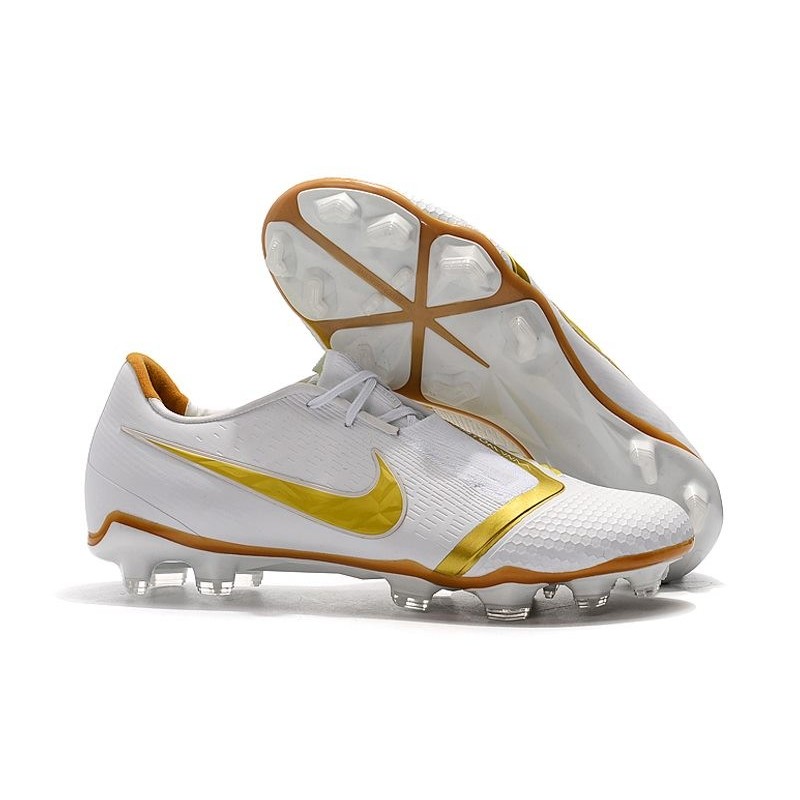 nike white and gold boots