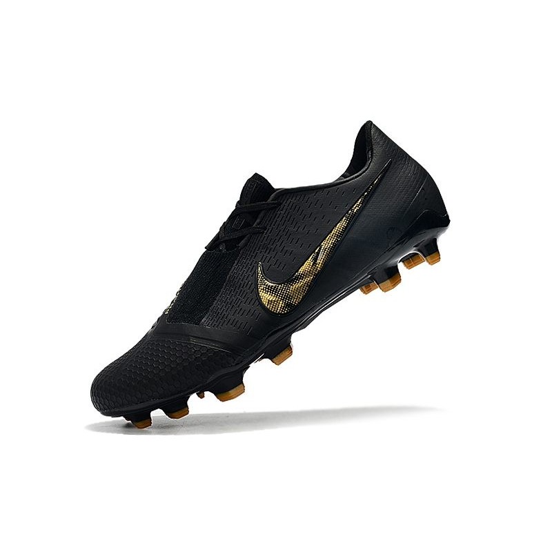 nike black gold boots