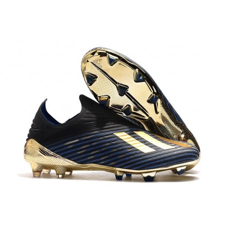 black and gold cleats soccer