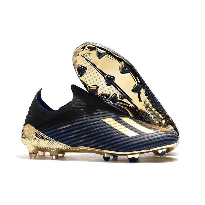 black and gold soccer cleats
