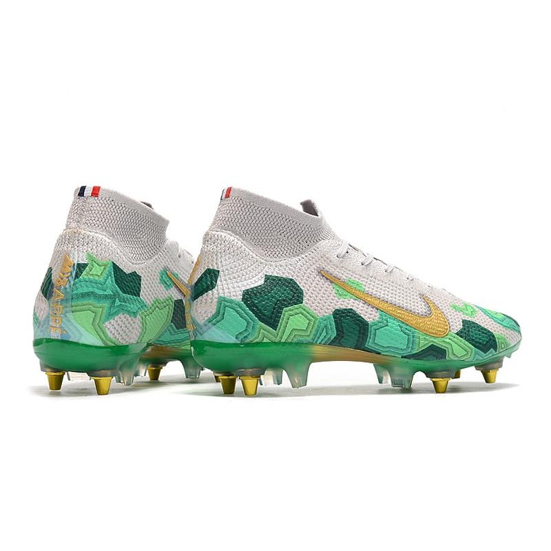 green and gold nike football cleats
