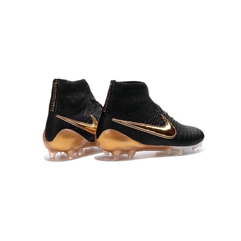 nike football boots black gold