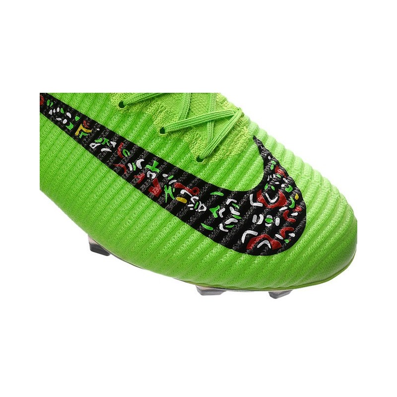 black and green nike boots