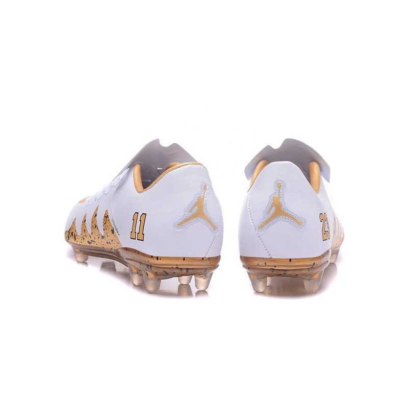 nike gold and white football cleats