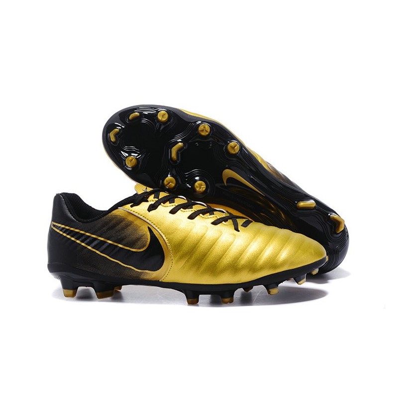 nike gold and black football shoes