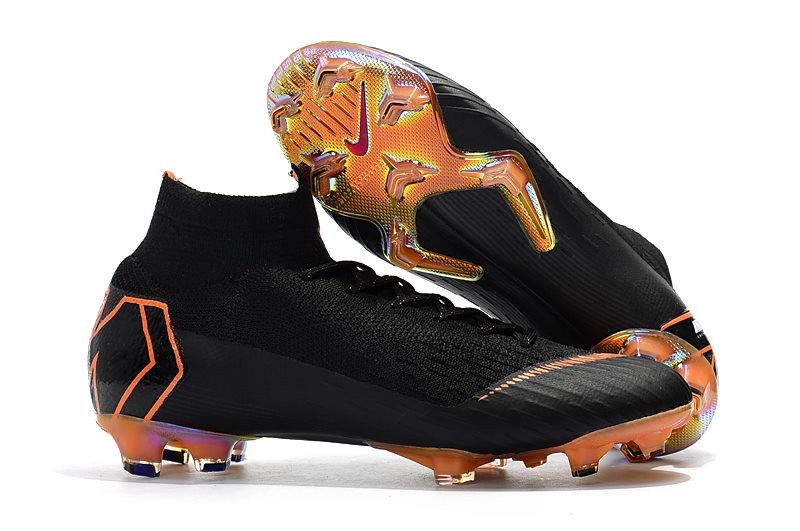 black and orange nike cleats