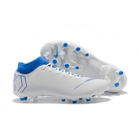 white and blue football boots