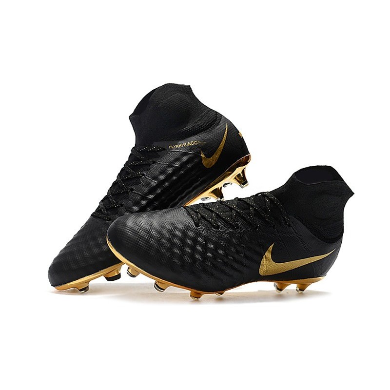 nike football boots black gold