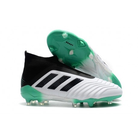 green and black soccer cleats