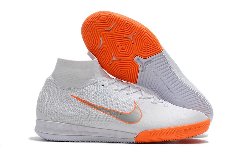white orange nike shoes