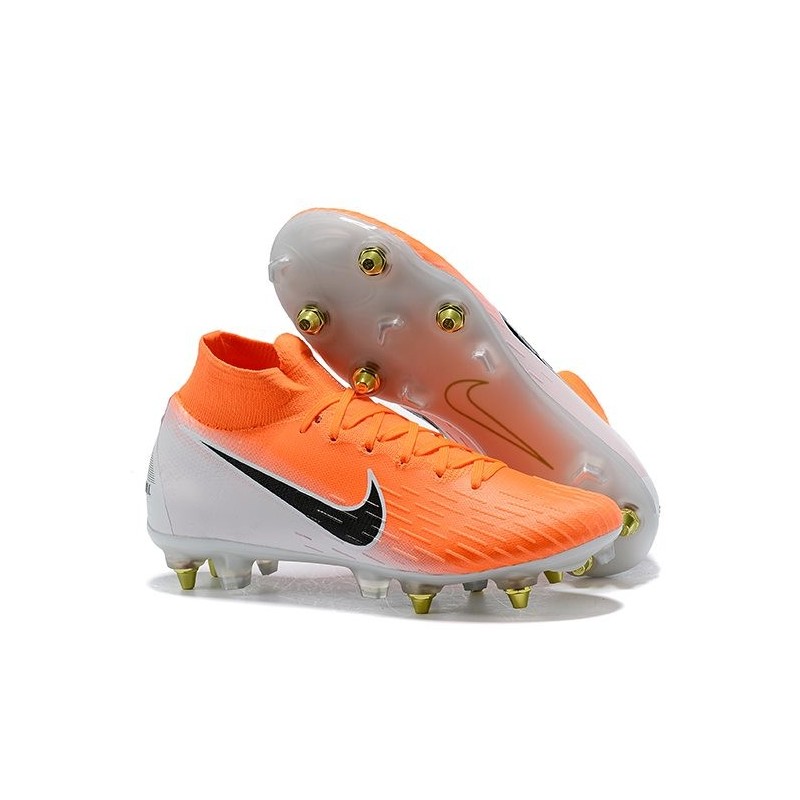 orange and white cleats